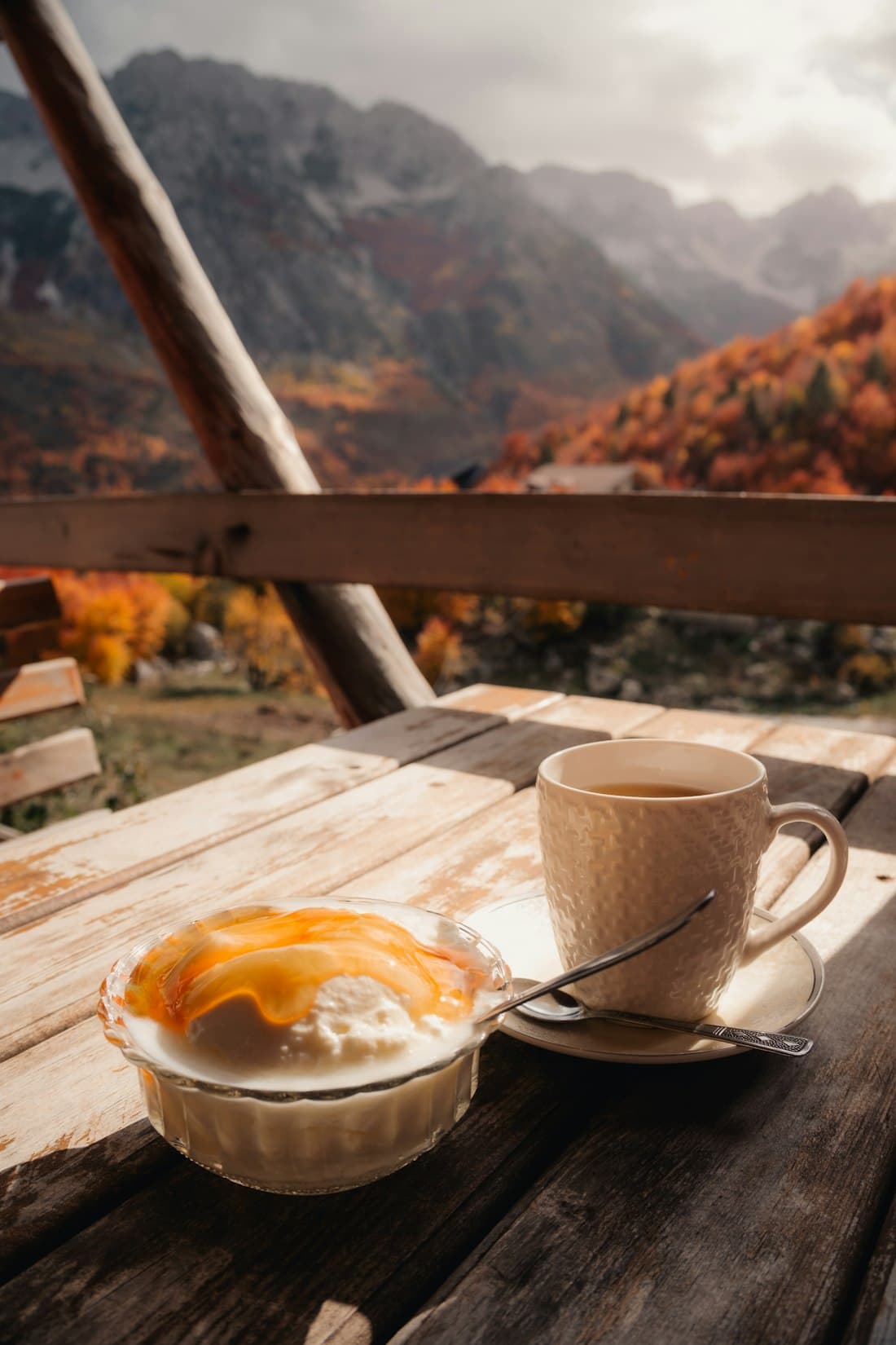Coffee on a table overlooking the hills