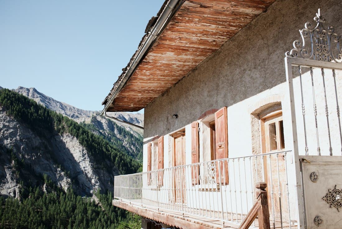 Old mountain cottage with wooden balconies