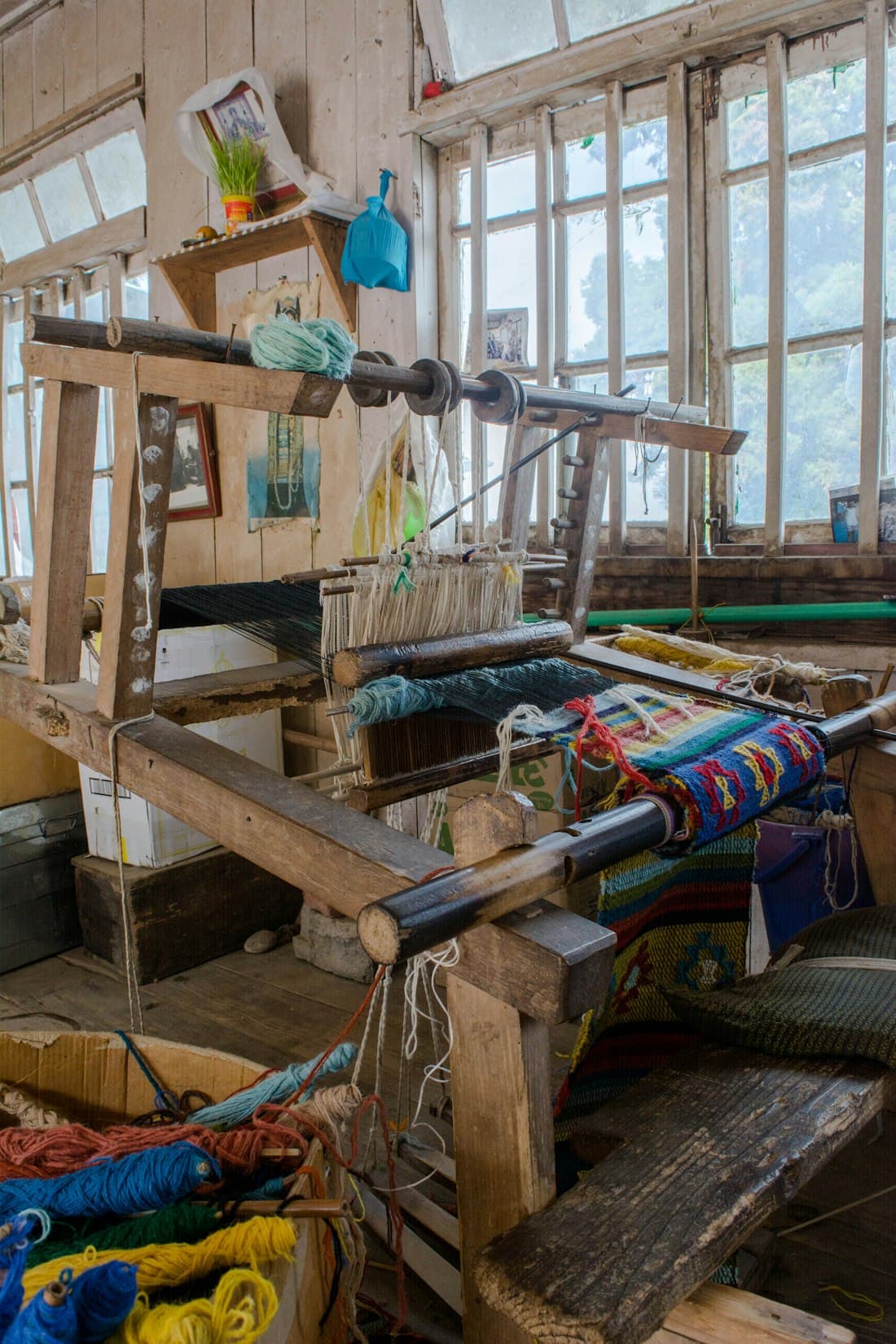 A wooden handloom in a weaving workshop
